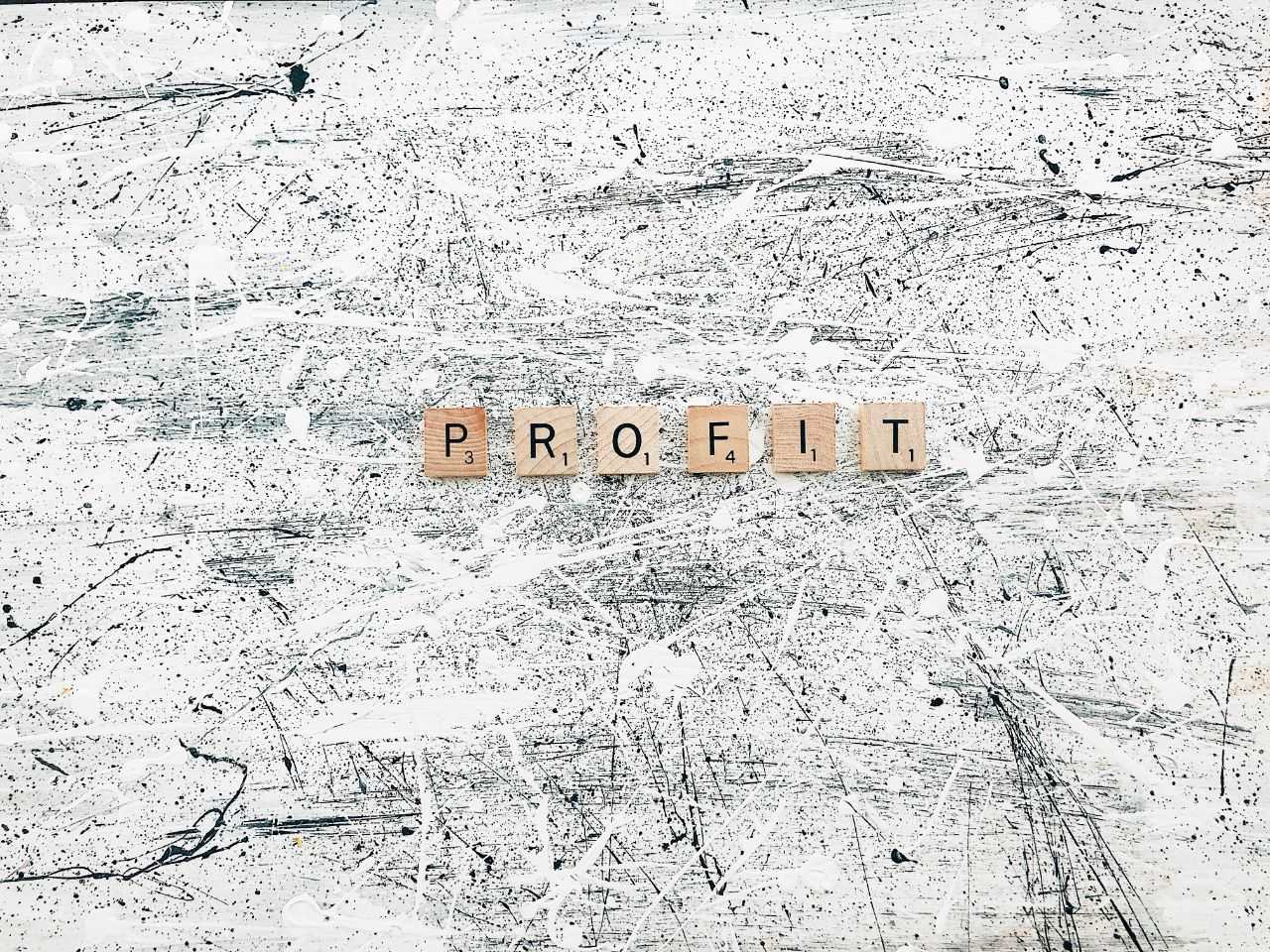 Word "profit" on abstract background